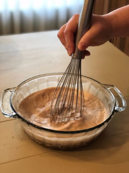 cream and chocolate being stirred together