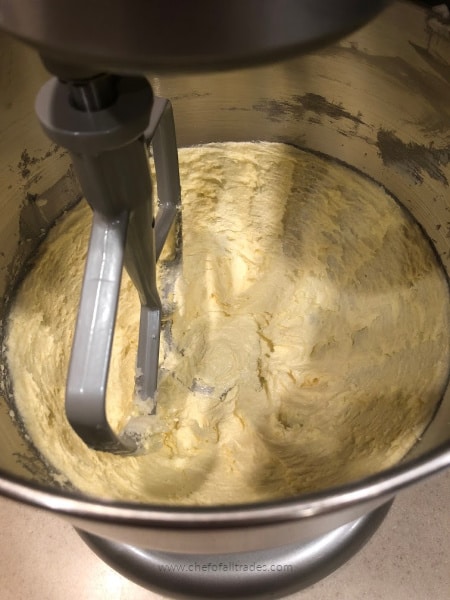 butter, sugar, and egg yolk creamed together in a mixing bowl