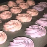 Cotton Candy Meringue Cookies on a baking sheet