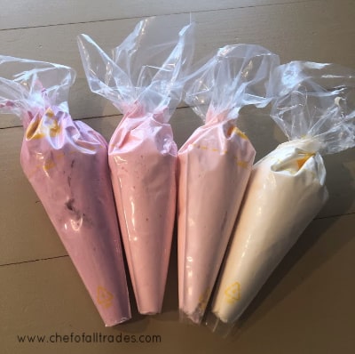 Piping bags with various colors of icing