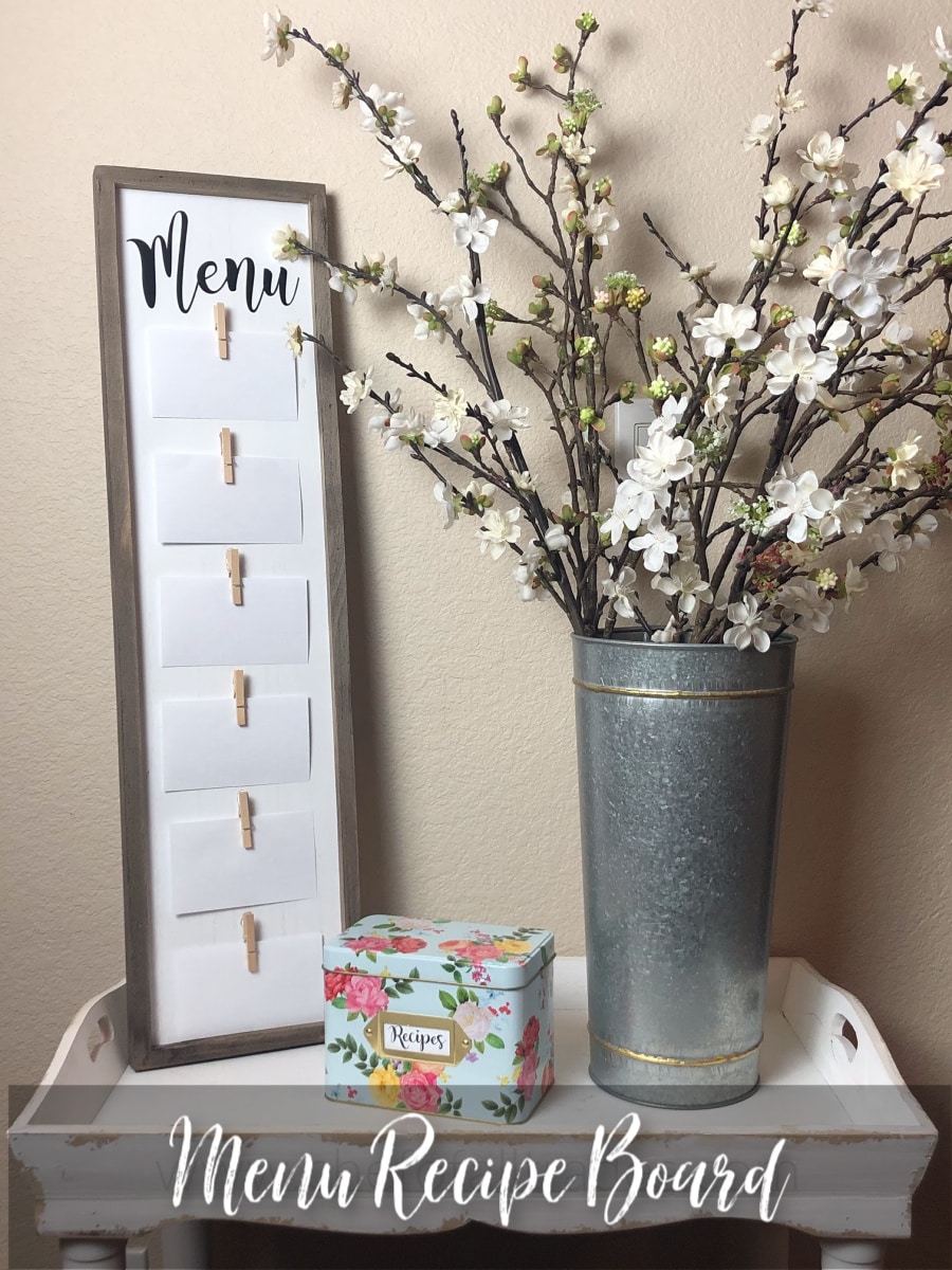 Menu Board on a table with flowers and a recipe box