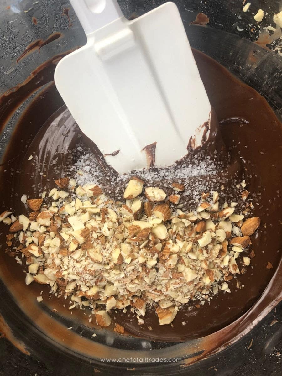 chopped almonds in melted choco