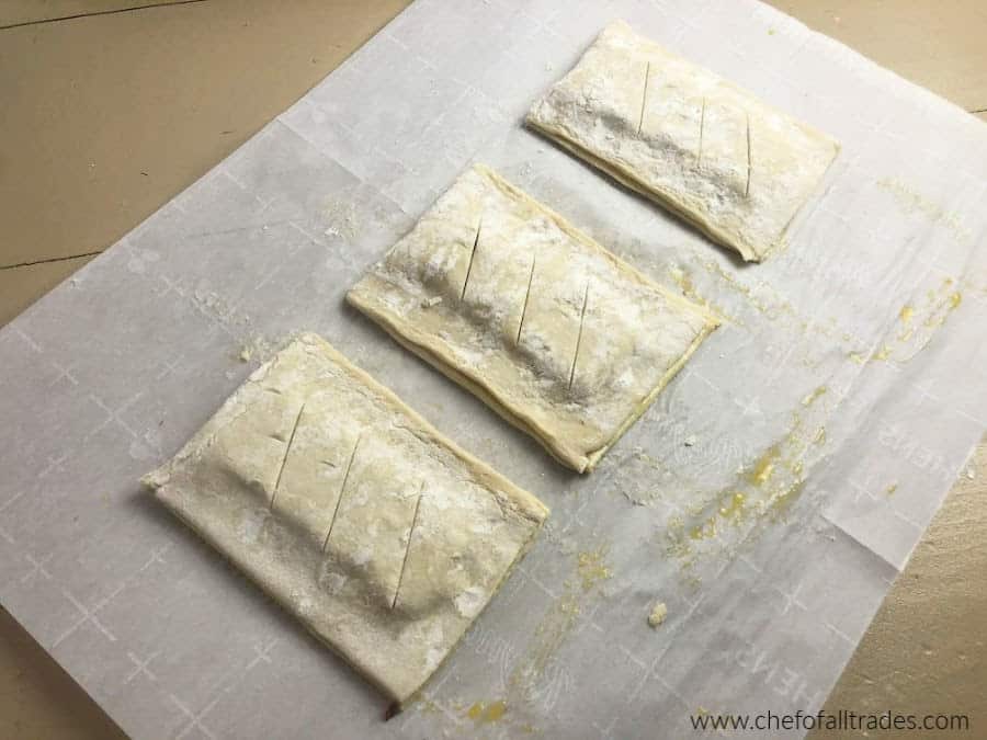 Folding over the puff pastry and sealing edges