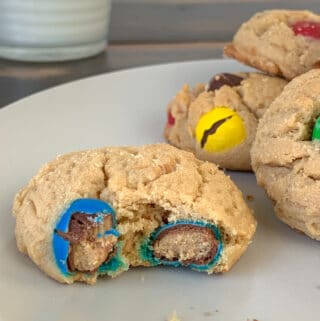 Double Peanut Butter M&M Cookie Recipe with a glass of milk in the background