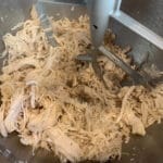 Instant Pot Shredded Chicken in a mixing bowl