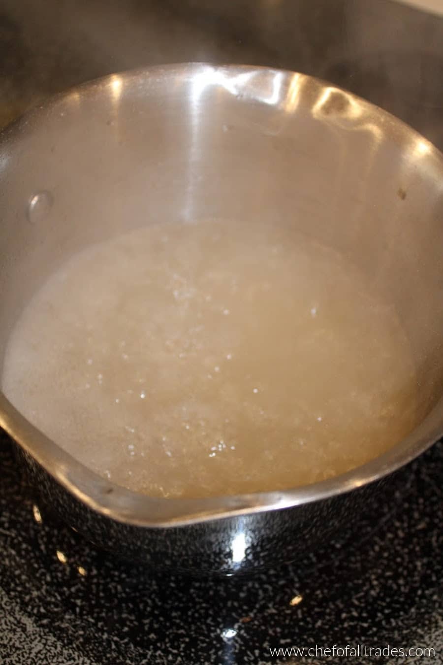 extract added and water boiling in pot