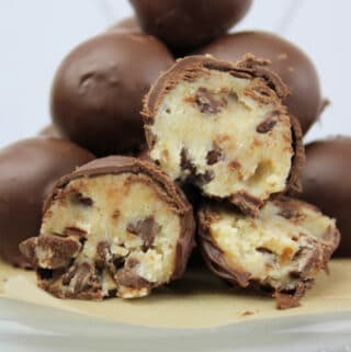 Chocolate Chip Cookie Dough Truffles stacked in a pyramid