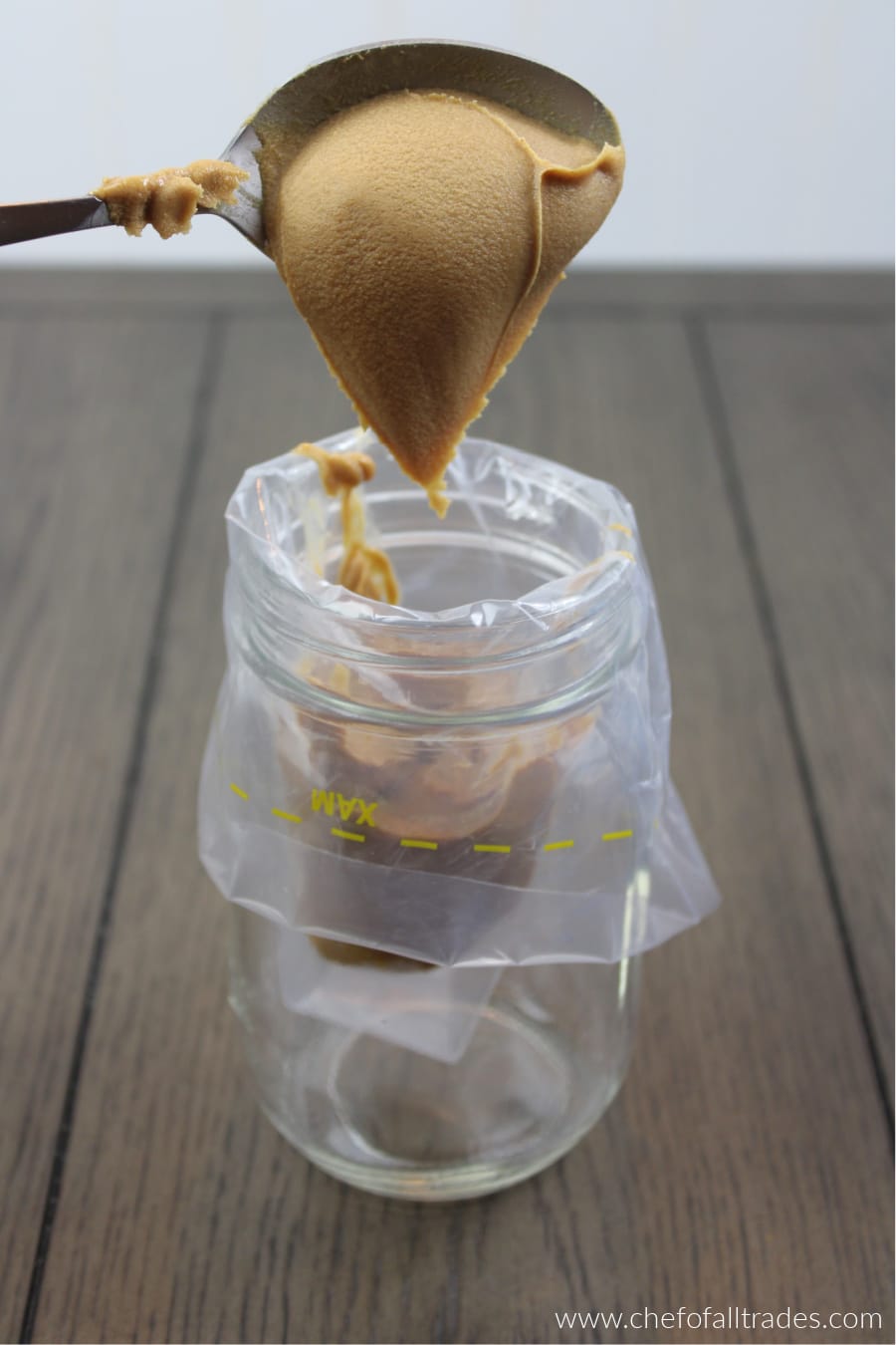 filling piping bag with peanut butter